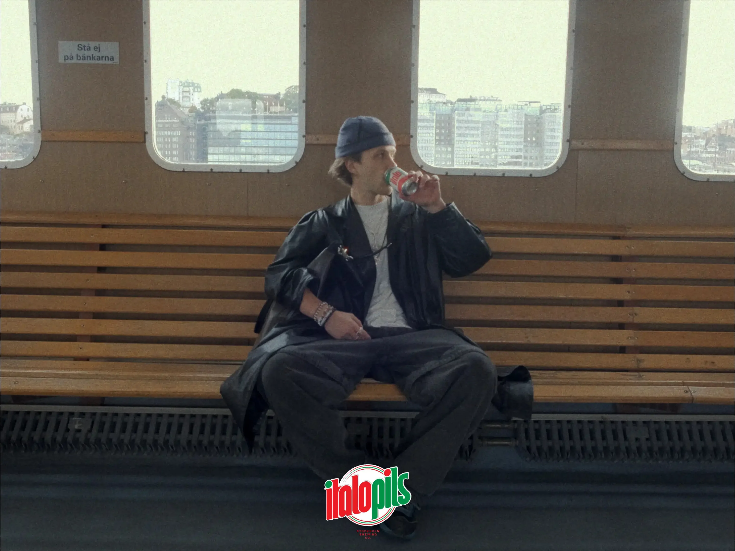 Film still: drinking ItaloPils on the ferry